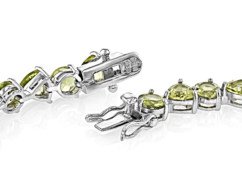 8.00ctw Trillion And 7.50ctw Round Manchurian Peridot™ Rhodium Over Silver Tennis Bracelet - Size 8