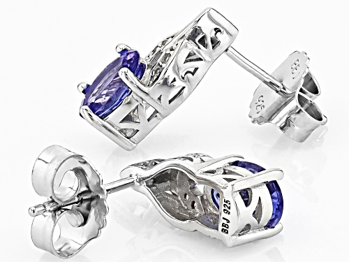 1.29ctw Oval Tanzanite With 0.05ctw Round White Zircon Rhodium Over Sterling Silver Earrings