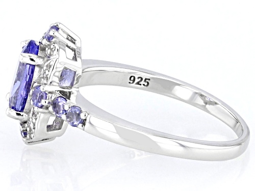 1.10ct Oval And 0.20ctw Round Tanzanite With .06ctw White Zircon Rhodium Over Silver Ring - Size 9