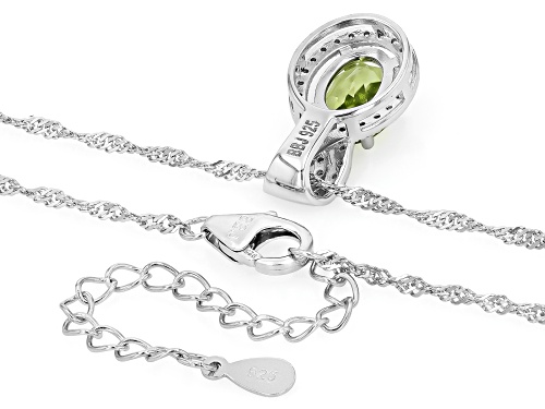 1.73ct Oval Manchurian Peridot™ With .20ctw White Zircon Rhodium Over Silver Pendant With Chain