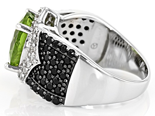 4.05ct Round Peridot With 0.95ctw Black Spinel, And 0.55ctw White Zircon Rhodium Over Silver Ring - Size 7