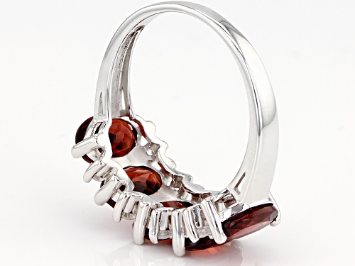 4.90ctw Oval Red Garnet With .45ctw Round White Zircon Rhodium Over Sterling Silver Ring - Size 7