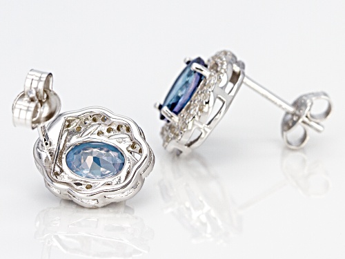 2.30CTW OVAL BLUE DANBURITE WITH .50CTW ROUND WHITE ZIRCON RHODIUM OVER SILVER STUD EARRINGS