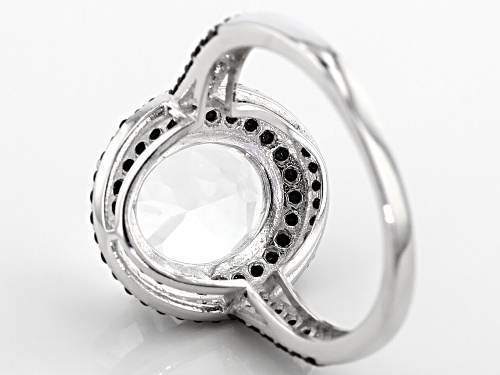 3.00CTW OVAL GOSHENITE WITH .78CTW ROUND BLACK SPINEL RHODIUM OVER SILVER RING - Size 8