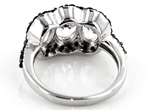 2.60CTW OVAL GOSHENITE WITH 1.37CTW ROUND BLACK SPINEL RHODIUM OVER SILVER 3-STONE RING - Size 8