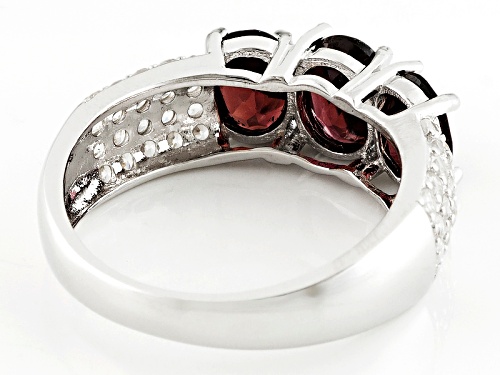 3.00ct Oval Red Zircon And .93ctw Round White Zircon Sterling Silver 3-Stone Ring - Size 12
