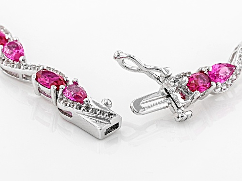 7.38ctw Lab Ruby, Pear Shape Lab Pink Sapphire And Lab White Sapphire Rhodium Over Silver Bracelet - Size 8