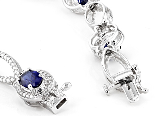 4.00ctw Lab Created Blue Sapphire With 0.01ctw Diamond Accent Rhodium Over Silver Bracelet - Size 7