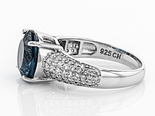 4.50ct Round London Blue Topaz With 0.96ctw Round White Zircon Rhodium Over Sterling Silver Ring - Size 9