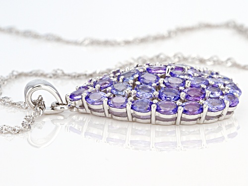 8.00ctw 4x3mm Oval Tanzanite Rhodium Over Sterling Silver Pendant With Chain