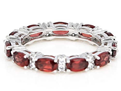 3.93ctw Oval Red Garnet  With 0.38ctw Round White Zircon Rhodium Over Sterling Silver Band Ring - Size 8