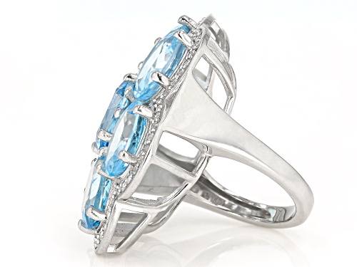 21.00ctw Oval Blue Topaz With 0.75ctw Round White Zircon Rhodium Over Sterling Silver Ring - Size 8
