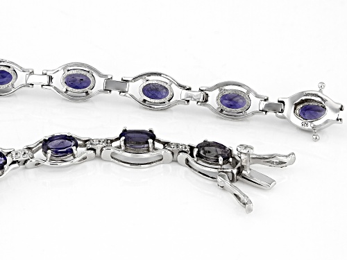 5.50ctw Oval Iolite With 0.30ctw Round White Zircon Rhodium Over Sterling Silver Bracelet - Size 7