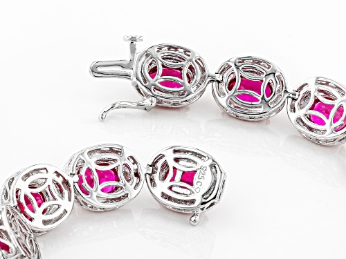 12.50ctw Oval Lab Created Ruby With White Diamond Accent Rhodium Over Sterling Silver Bracelet - Size 8
