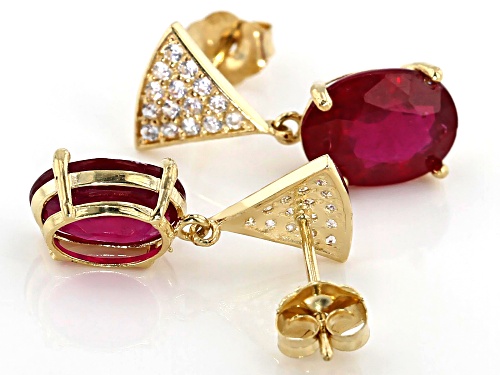 3.50ctw Oval Mahaleo® Ruby With .26ctw Round White Zircon 10k Yellow Gold Dangle Earrings