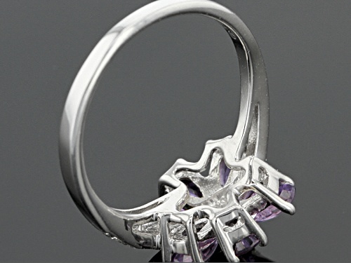 Exotic Jewelry Bazaar™1.23ctw Pear Shape Purple Ceylon Sapphire & .04ctw White Zircon Silver Ring - Size 11