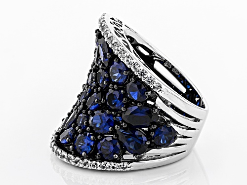 8.23CTW LAB CREATED BLUE SAPPHIRE WITH .79CTW WHITE ZIRCON RHODIUM OVER STERLING SILVER RING - Size 7