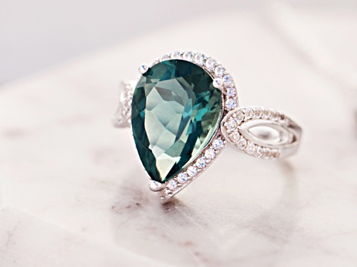 5.42ct Pear Shape Teal Fluorite With .50ctw Round White Topaz Sterling Silver Ring - Size 9