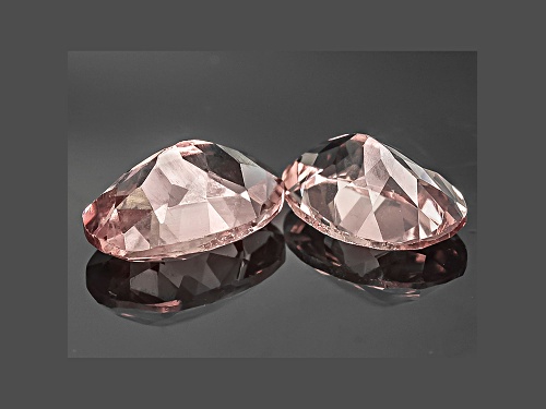 Matched pair of color shift Masasi Bordeaux Garnet™ min 1.00ctw 6x4mm oval