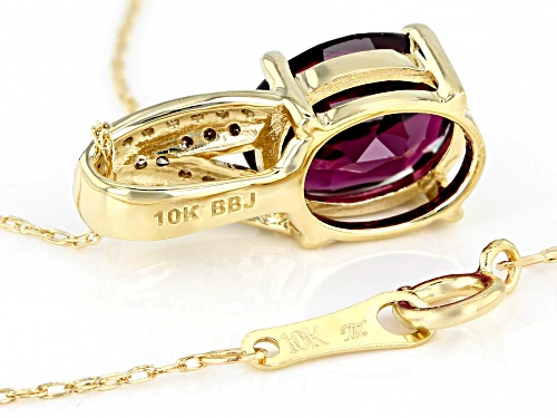1.62ct Oval Grape Color Garnet & .07ctw Champagne Diamond Accent 10k Yellow Gold Pendant W/Chain