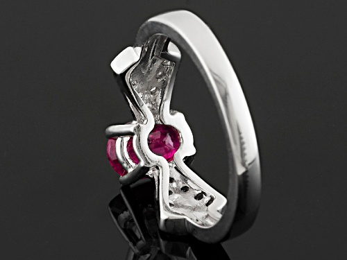 .68ct Oval Ruby And .13ctw Round White Zircon Sterling Silver Ring - Size 7