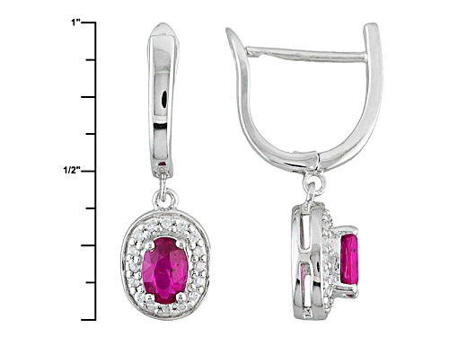 .85ctw Oval Ruby And .27ctw Round White Zircon Sterling Silver Earrings
