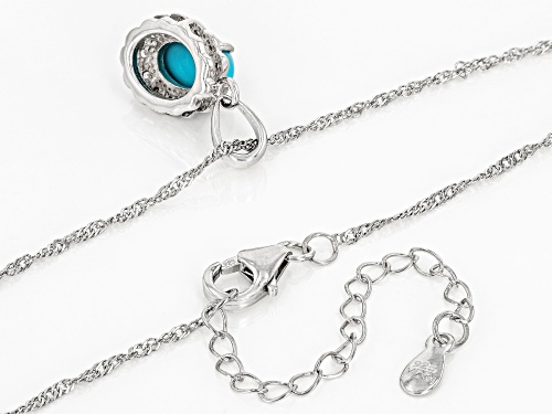 9x7mm Oval Sleeping Beauty Turquoise With .08ctw White Zircon Rhodium Over Silver Pendant With Chain