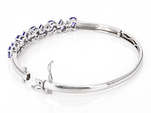 3.24ctw Tanzanite With 0.18ctw White Zircon Rhodium Over Sterling Silver Bangle Bracelet - Size 8