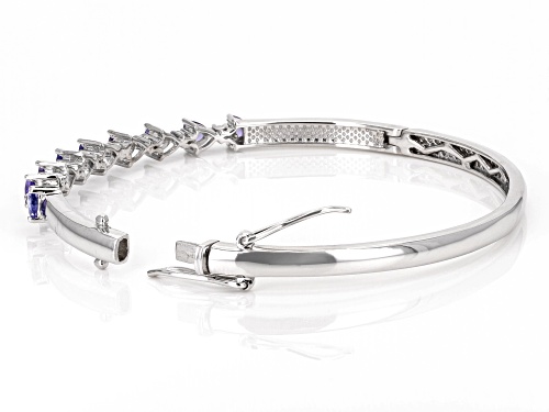 1.78ctw Tanzanite with 0.64ctw White Zircon Platinum Over Sterling Silver Bangle - Size 8