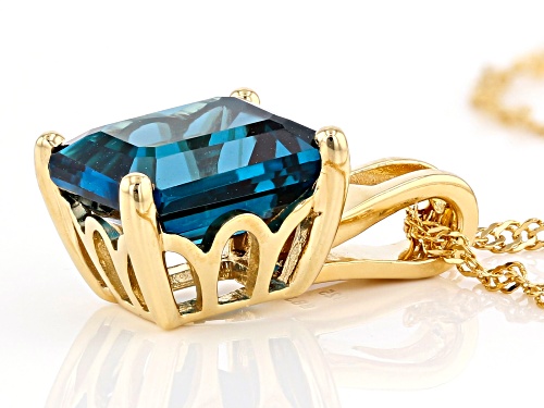 6.37ct emerald cut London blue topaz 18k yellow gold over sterling silver pendant with chain