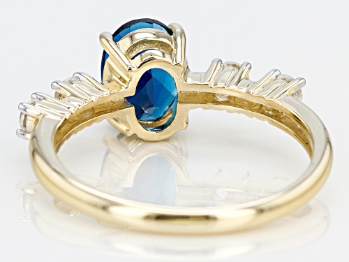 1.28ct Oval London Blue Topaz With .34ctw Round White Zircon 10k Yellow Gold Ring - Size 9
