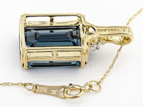 8.30ct Emerald Cut London Blue Topaz With .02ctw White Zircon 10k Yellow Gold Pendant With Chain
