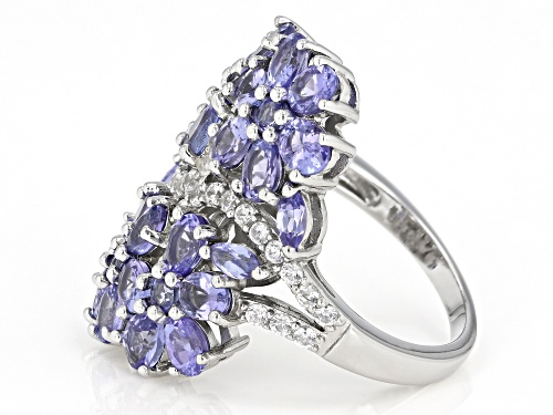 3.33ctw Mixed Shape Tanzanite with .56ctw White Zircon Rhodium Over Sterling Silver Ring - Size 7