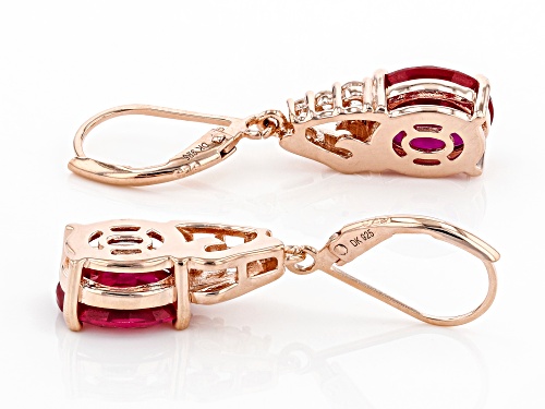 5.78ctw Oval Lab Created Ruby & .26ctw Zircon 18k Rose Gold Over Silver Earrings