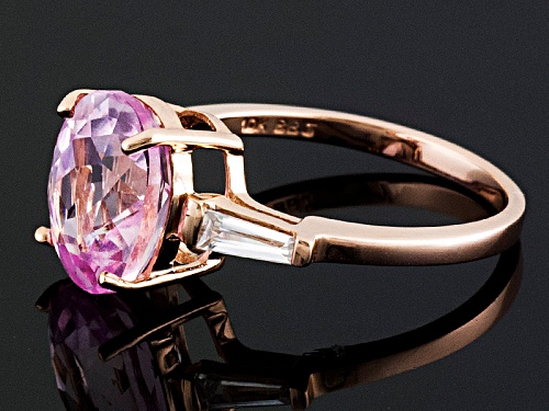 4.69ct Oval Kunzite And .57ctw Tapered Baguette White Zircon 10k Rose Gold Ring - Size 11