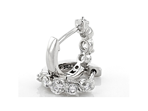 MOISSANITE FIRE(R) .56CTW DEW ROUND PLATINEVE(R) HUGGIE EARRINGS
