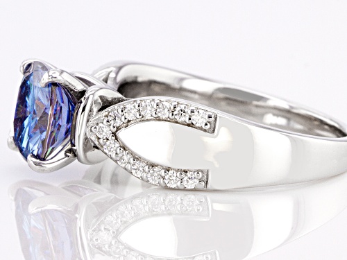 MOISSANITE FIRE(R) AND BLUE MOISSANITE 2.24CTW DEW CUSHION CUT & ROUND PLATINEVE(R) RING - Size 8