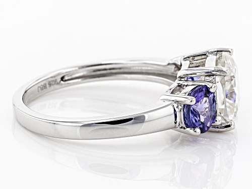 Moissanite Fire® 2.00ct Dew Cushion Cut And 1.04ctw Round Tanzanite Platineve™ Ring - Size 6