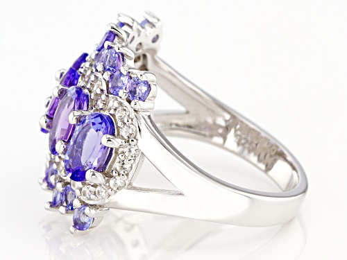 1.91ctw Oval and .68ctw Round Tanzanite with .36ctw White Zircon Rhodium Over Silver Band Ring - Size 7