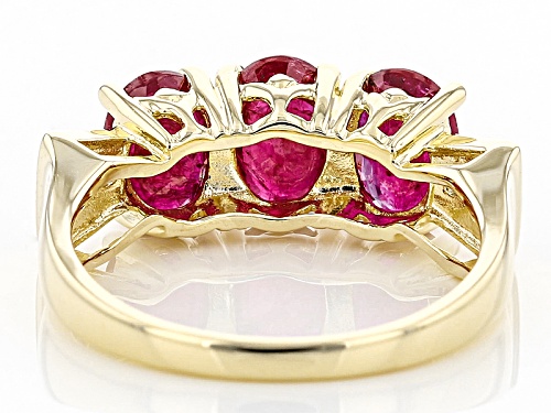 2.16ctw Oval Ruby With .02ctw Round White Zircon 10k Yellow Gold 3 Stone Band Ring - Size 8