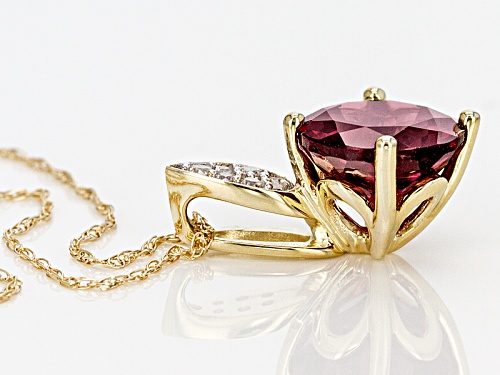 1.80ct Round Grape Color Garnet With .06ctw Round White Zircon 10k Yellow Gold Pendant With Chain.