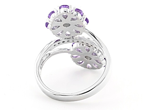 1.90ctw Pear Shape Amethyst and 0.38ctw White Zircon Rhodium Over Silver Flower Bypass Ring - Size 8