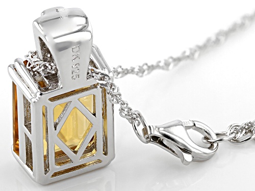 5.40ct Emerald Cut Citrine and .36ctw White Zircon Rhodium Over Sterling Silver Pendant With Chain