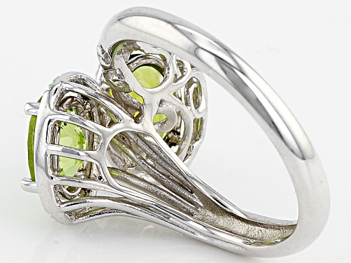 2.50ctw Oval Manchurian Peridot™ And .20ctw Round White Zircon Sterling Silver Ring - Size 7