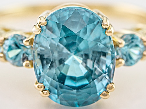 4.35ctw Oval And Round Blue Zircon 14k Yellow Gold Ring - Size 9