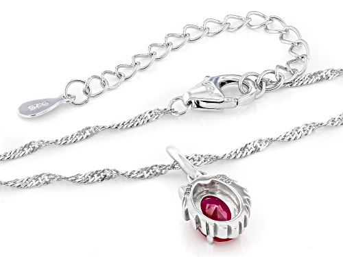 Pre-Owned 0.81ct Oval Lab Created Ruby Rhodium Over Sterling Silver Leo Birthstone Pendant With Chai