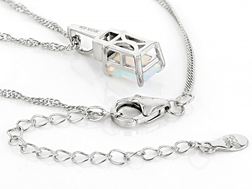 Pre-Owned 0.75ct Ethiopian Opal With 0.12ct London Blue Topaz Rhodium Over Sterling Silver Pendant w