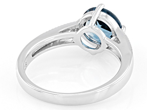 Pre-Owned 2.04ct London Blue Topaz With 0.08ctw White Zircon Rhodium Over Sterling Silver Ring - Size 5