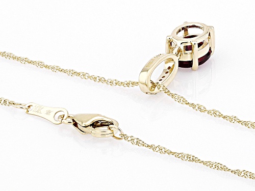Pre-Owned 1.19ct Grape Garnet And 0.03ctw White Diamond 10k Yellow Gold Pendant With Chain