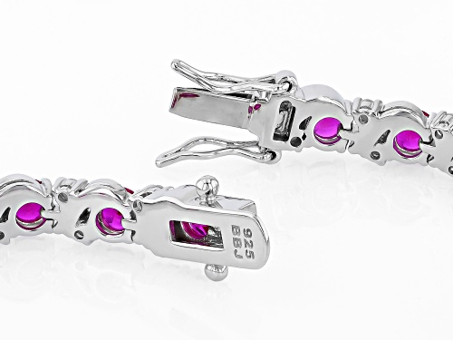 Pre-Owned 5.95ctw Lab Created Ruby With 0.85ctw White Zircon Rhodium Over Sterling Silver Bracelet - Size 7.25